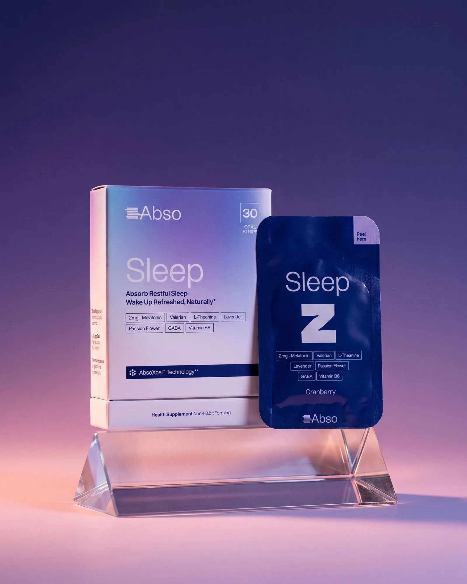 Abso Sleep box and sachet on a glass stand
